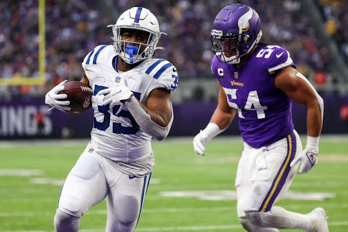 Dec 17, 2022; Minneapolis, Minnesota, USA; Indianapolis Colts running back Deon Jackson (35) makes a catch for a touchdown against the Minnesota Vikings during the first quarter at U.S. Bank Stadium. Mandatory Credit: Matt Krohn-USA TODAY Sports